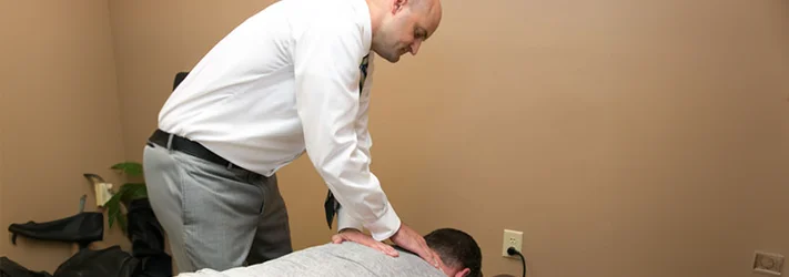 Chiropractor Pensacola FL J. Blake Gilmore Back Adjustment